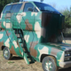 Image for article titled Frankenstein Hunting Rig Has A Minivan Grafted Onto Its Roof